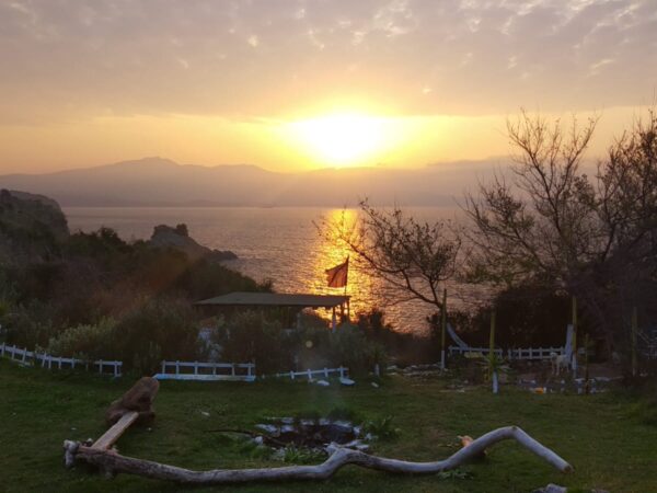 Camping and beach escape: sunset, nature & local flavors